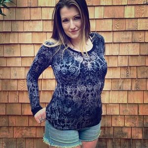 Soft stretch long sleeve crew neck top.